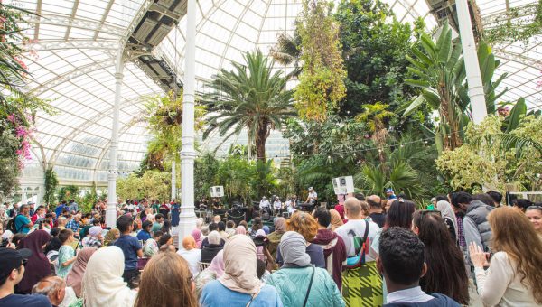 A crowd gathered inside the Sefton Park Palmhouse for the Liverpool Arab Arts Festival family day.