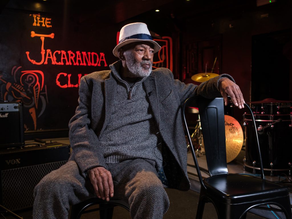 New exhibition to tell the story of Black musicians from Toxteth – ‘The Harlem of Europe’ Joe Ankrah sitting on a chair in the Jacaranda